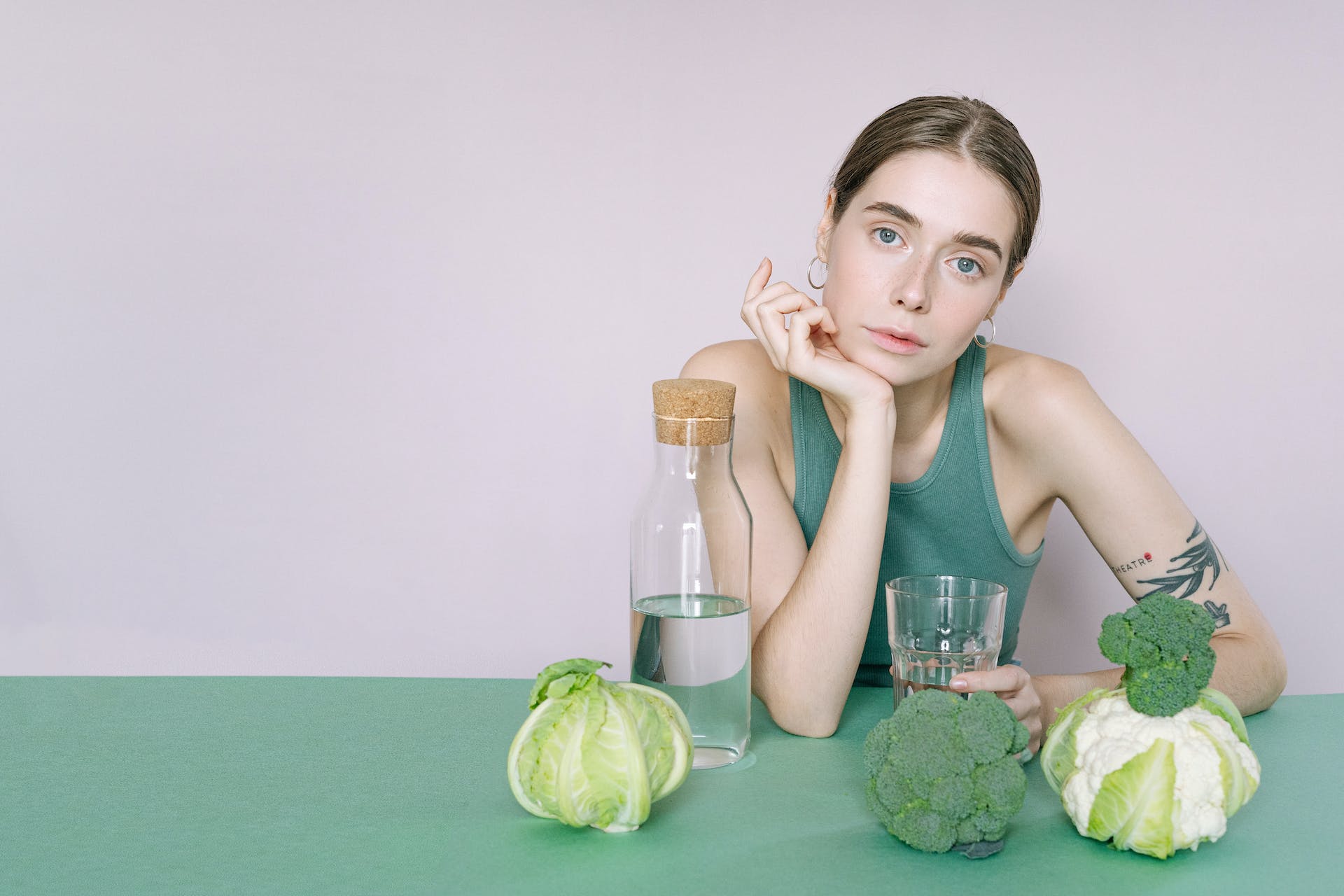 Thin unhappy woman contemplating diet culture